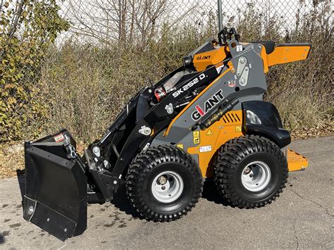 mini skid steer in use|operating a mini skid steer.